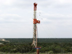 A rig contracted by Apache Corp drills a horizontal well in a search for oil and natural gas in the Wolfcamp shale located in the Permian Basin in West Texas in this file photo from October 29, 2013. Apache Corp and a handful of smaller independent companies are using seismic surveying and horizontal drilling - techniques perfected during the onshore fracking boom - to tap mature fields and find hidden reserves on the Gulf of Mexico shelf. (REUTERS/Terry Wade/Files)