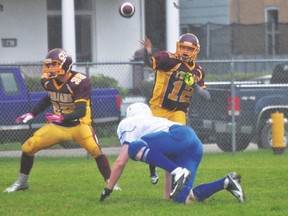 Gage Foster of the PCI Trojans throws during PCI's 41-14 loss to River East Sept. 4. (Kevin Hirschfield/The Graphic)