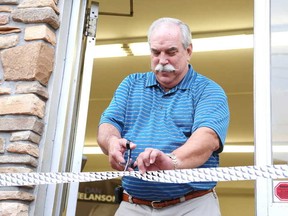 Gino Donato/The Sudbury Star
Sudbury mayoral candidate Dan Melanson cut the moustache-covered ribbon at the grand opening Thursday of his campaign headquarters on Paris Street.