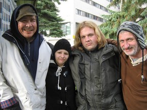 Vincent Harper, left, Alexandria Leclair, Ben Naker and David Dubois at Occupy Sudbury at Memorial Park in 2011.