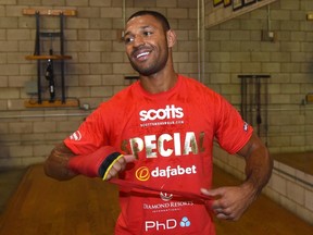 Boxer Kell Brook unwraps his hands during a media workout at Barry's Gym on August 6, 2014 in Las Vegas, Nevada. (Ethan Miller/Getty Images/AFP)