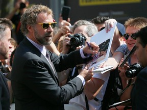 Actor Will Ferrell greets fans at the gala for "Welcome to Me" at the Toronto International Film Festival (TIFF), in Toronto September 5, 2014. (REUTERS/Mark Blinch)