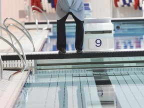 Councillor Mark Grimes, who is Chairman of the City's Pan Am Games Secretariat, jokingly attempts a dive during a sneak peek of the Pan Am/Parapan Am Aquatics Centre inside the Toronto Pan Am Sports Centre on Sept. 5, 2014. (Veronica Henri/Toronto Sun)