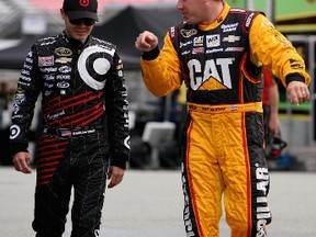 Kyle Larson  talks with Ryan Newman. The two will take part in the Auto Parts 400 Saturday night. (Getty)