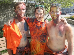Australian students Steve Savage, Madi Roberts and Daniel McLeod, covered in paint thanks to orientation week activities, are on a one-semester exchange at Queen's University. All three are from the University of Western Australia in Perth. FRI., SEPT 5, 2014 KINGSTON, ONT. MICHAEL LEA\THE WHIG STANDARD\QMI AGENCY