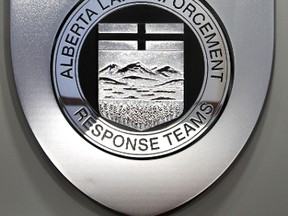 The Alert shield in the lobby of their offices in Edmonton, Alberta. FILE PHOTO