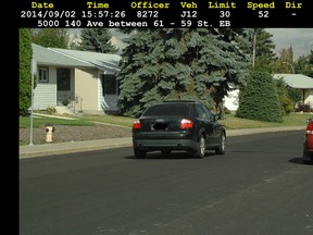 A vehicle passes York Elementary School at 13915 - 61 St., travelling at 52 Kms in a 30 km zone.  As of September 2, 2014 school zones came into effect around elementary schools throughout Edmonton. Motorists are required by law to slow down to 30 km/h between 8 am and 4:30 pm on school days where school zone signs are posted. Photo Courtesy/City of Edmonton
