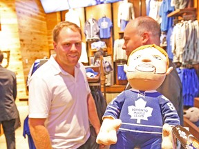 Maple Leafs star Phil Kessel is shown a doll in his likeness (well, kinda) Friday during the opening of the expanded Real Sports at the Air Canada Centre. Kessel appeared amused by the doll, which is on sale at the store, but declined to pose with it. (Michael Peake, Toronto Sun)