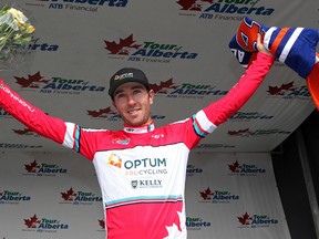 Ryan Anderson celebrates taking the Maple Leaf jersey as top Canadian rider at the end of Stage 3 of the Tour of Alberta. (David Bloom, Edmonton Sun)