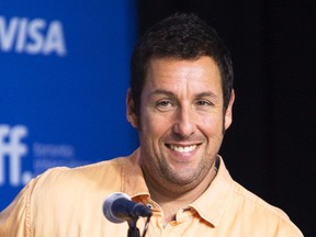 Adam Sandler attends a news conference to promote the film Men, Women & Children at the Toronto International Film Festival in Toronto, September 6, 2014.  REUTERS/Fred Thornhill