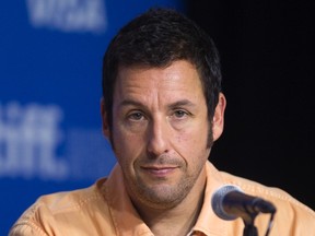 Actor Adam Sandler attends a news conference to promote the film "Men, Women & Children" at TIFF the Toronto International Film Festival in Toronto September 6, 2014. REUTERS/Fred Thornhill