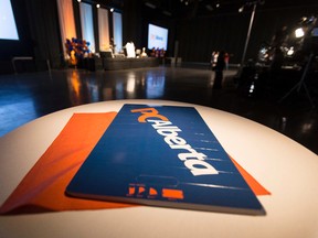 Party signs are seen during the first ballot of the 2014 PC Leadership Vote at the Edmonton Expo Centre in Edmonton, Alta., on Saturday, Sept. 6, 2014. Thomas Lukaszuk, Jim Prentice and Ric McIver are candidates. Ian Kucerak/Edmonton Sun/ QMI Agency