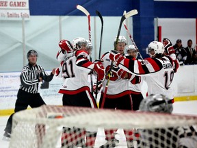 The Ottawa 67's celebrate a first-period goal by winger Ben Fanjoy Saturday night as Ottawa opened its pre-season schedule at the Nepean Sportsplex against the Gatineau Olympiques. (Chris Hofley/Ottawa Sun)