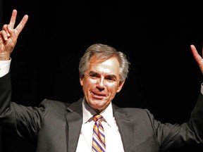 Jim Prentice celebrates his victory on Saturday night. Tom Braid/QMI Agency