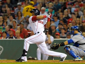 Boston Red Sox left fielder Yoenis Cespedes (52) hits an RBI double during the third inning against the Toronto Blue Jays at Fenway Park on Sep 6, 2014 in Boston, MA, USA. (Bob DeChiara/USA TODAY Sports)
