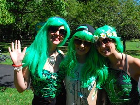 OG Blunts, 25, Royal AK, 24 and Tokerella, 25, are members of the "High 5," a pro-marijuana advocacy group. They showed up at High Park Sunday to answer questions about medical marijuana licences and weed in general. (MATT INGRAM, Toronto Sun)