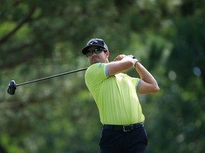 Adam Hadwin of Canada hits his drive on the third hole during the final round of the Chiquita Classic held at River Run Country Club on September 7, 2014 in Davidson, North Carolina.  (Michael Cohen/Getty Images/AFP)