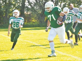 Avery Spence of the Portage Pitbulls bantam team takes it to the endzone for a touchdown during a Pitbulls win over Greendell Sept.7. (Kevin Hirschfield/The Graphic)