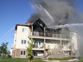 24 people are displaced after fire ripped through a 12-unit building on Meadowlilly Rd. in Findlay Creek in the south end Sunday, Sept. 7, 2014. (Twitpic courtesy @OFSFirePhoto)