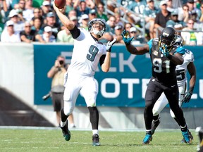 Philadelphia Eagles quarterback Nick Foles (9) throws a 68-yard touchdown pass to wide receiver Jeremy Maclin (not pictured) during the fourth quarter against the Jacksonville Jaguars on Sunday. (USA Today Sports)