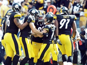 Pittsburgh Steelers kicker Shaun Suisham (6) of Wallaceburg is congratulated after making a 41-yard field goal as time expired to beat the Cleveland Browns 30-27 in Sunday's season opener at Heinz Field in Pittsburgh. "When he lines up to kick it, I was on the sideline like, 'This was why we have him,' " Steelers quarterback Ben Roethlisberger said. "There was never a doubt that he wasn't going to nail it." Suisham was 3-for-3 on field goals. He was good from 36 and 34 yards as the Steelers built a 27-3 lead that disappeared in the second half. (JASON BRIDGE/USA Today)