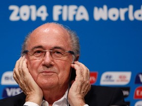 FIFA President Sepp Blatter attends a news conference at the Maracana stadium in Rio de Janeiro July 14, 2014. (REUTERS/Pilar Olivares)