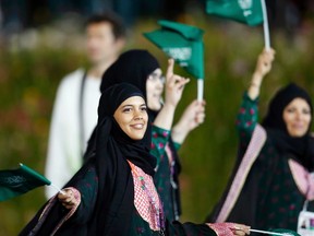 Saudi Arabia's contingent takes part in the athletes parade during the opening ceremony of the London 2012 Olympic Games at the Olympic Stadium July 27, 2012. (REUTERS/Suzanne Plunkett)