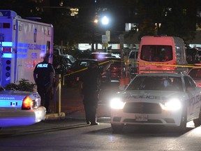 Peel police at a deadly shooting at Brampton Towers. (ANDREW COLLINS/Special to the Toronto Sun)
