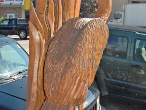 A wooden heron sculpture was vandalized sometime over the Labour Day weekend. KRISTINE JEAN/MITCHELL ADVOCATE