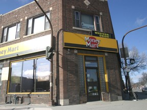 A Money Mart at Selkirk Avenue and Salter Street. Money Mart won't be allowed to expand its operations at its downtown location to include a pawn shop, a city committee ruled Monday. (FILE PHOTO)
