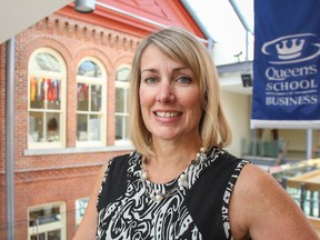 Professional engineer, teacher and consultant Annette Bergeron poses for a photo outside The Monieson Centre in Goodes Hall at Queen's University. Bergeron has been named to the Top 25 Women of Influence for the second year in a row. Julia McKay/The Whig-Standard