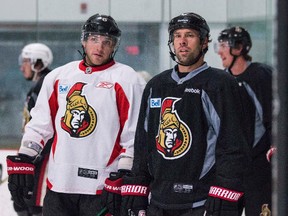 Steak or seafood? Bobby Ryan and David Legwand chat during a recent practice at the Sensplex. (Errol McGihon/Ottawa Sun)