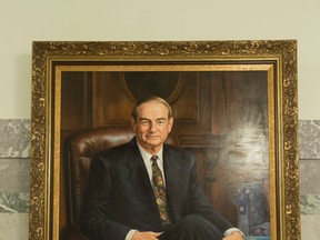 Premier Don Getty's portrait is seen on the third floor of the Alberta Legislature rotunda near the office of the Premier of Alberta in Edmonton, Alta., on Tuesday, Aug. 12, 2014. Previous Premiers have had their portraits painted and displayed on the wall for the public to see. Ian Kucerak/Edmonton Sun
