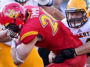 The U of A Golden Bears dropped their season opener 71-3 against the U of C Dinos in Calgary on Friday. (Photo courtesy David Moll)