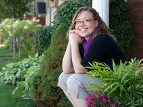 Entrepreneur Amanda Stark, who has previously suffered a brain injury, is spearheading a new venture providing in-home care to seniors.  Stark is pictured here sitting on the front steps of her home in London, Ontario on Monday September 8, 2014. (CRAIG GLOVER, The London Free Press)