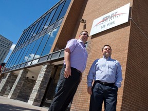Peter Rocca and Darryl Olthoff, founders of Start Communications on York St. (CRAIG GLOVER, The London Free Press)