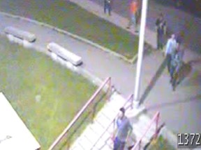 Investigators are hoping the public can help identify six suspects — four men and two women — thought to be responsible for vandalizing a war monument at Malvern Collegiate. (Toronto Police photo)