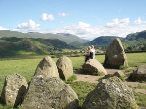 Sitting on a stone at the Castlerigg circle, in England’s Lake District, inspires contemplation. RICK STEVES PHOTO