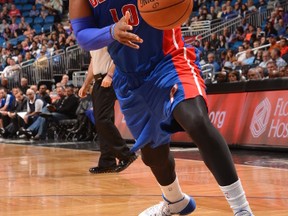 Greg Monroe #10 of the Detroit Pistons drives baseline against the Orlando Magic.  (Fernando Medina/NBAE via Getty Images/AFP)