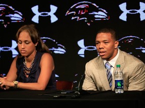 Running back Ray Rice addresses a news conference with his wife Janay at the Ravens training center on May 23, 2014 in Owings Mills, Maryland. (Rob Carr/Getty Images/AFP)