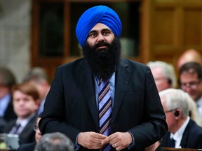 Canada's Minister of State for Democratic Reform Tim Uppal speaks during Question Period on Parliament Hill in Ottawa June 11, 2013.    REUTERS/Blair Gable