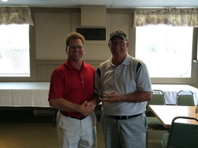 Bob Chipman (right) is presented with the Club Champions plaque after he won the Greenwood Golf Course club championship recently. (Submitted photo)