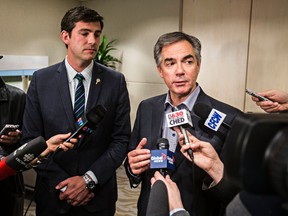Edmonton Mayor Don Iveson, left, and Alberta Premier-designate Jim Prentice, right, hold a media availability after holding a meeting in the mayor's office at City Hall in Edmonton, Alta., on Tuesday, Sept. 9, 2014. Codie McLachlan/Edmonton Sun/QMI Agency