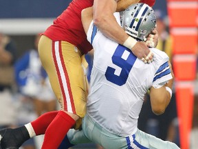 Cowboys quarterback Tony Romo had an awful game against the 49ers, leading to Dallas being underdogs against Tennessee. (USA TODAY SPORTS)