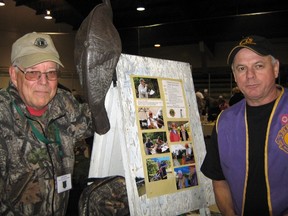 Sudbury Star file photo
Gary Lampi, left, and Neville Moores, of the Whitefish District Lions Club, promote the club's annual turkey shoot at Sunday's Crean Hill Gun Club Show.