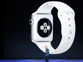 Apple CEO Tim Cook speaks during an Apple event announcing the iPhone 6 and the Apple Watch at the Flint Center in Cupertino, Calif., Sept. 9, 2014. REUTERS/Stephen Lam