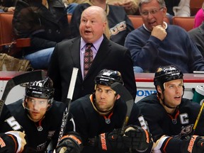 Anaheim Ducks head coach Bruce Boudreau coaches from the bench during their NHL hockey game against the Columbus Blue Jackets in Anaheim, California, April 17, 2013. (REUTERS/Mike Blake)