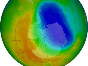 A false-color view of total ozone over the Antarctic pole is seen in this NASA handout image released October 24, 2012. The purple and blue colors are where there is the least ozone, and the yellows and reds are where there is more ozone. (REUTERS/NASA/Handout)