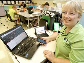 Patti Duchene, a Grade 7/8 teacher at Indian Creek Road Public School is nearing the end of teaching career, but she has embraced the introduction of technology in the classroom, noting it has helped boost student engagement in the lessons she teaches. (DIANA MARTIN, The Daily News)