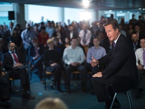 Britain's Prime Minister David Cameron speaks during a visit to the offices of financial company Scottish Widows in Edinburgh, Scotland September 10, 2014. Cameron said on Wednesday that he would be heartbroken if Scots vote in next week's referendum on independence to tear apart the family of the nations of the United Kingdom. The referendum on Scottish independence will take place on September 18, when Scotland will vote whether or not to end the 307-year-old union with the rest of the United Kingdom.  REUTERS/James Glossop